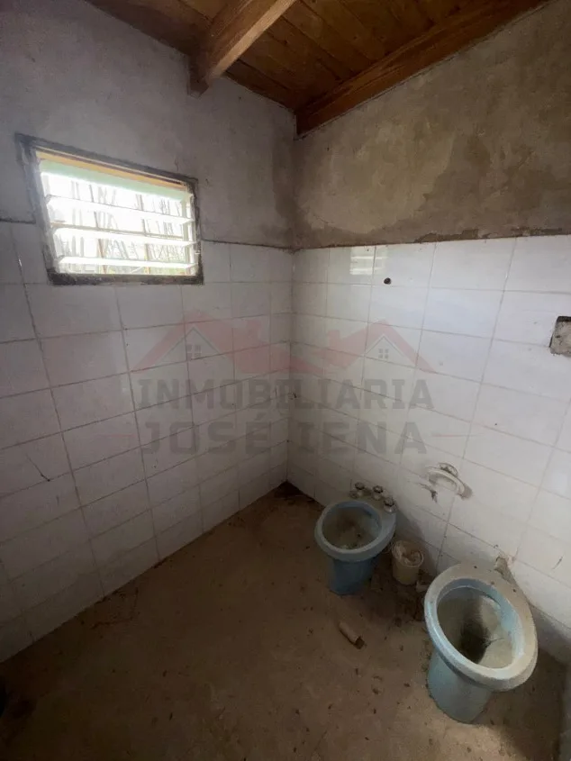 Lote de 1.125 m2 con Casa monoambiente - Calle 28 e/ Paso y Moreno. A 1 cuadra de Avenida 9 de Julio.